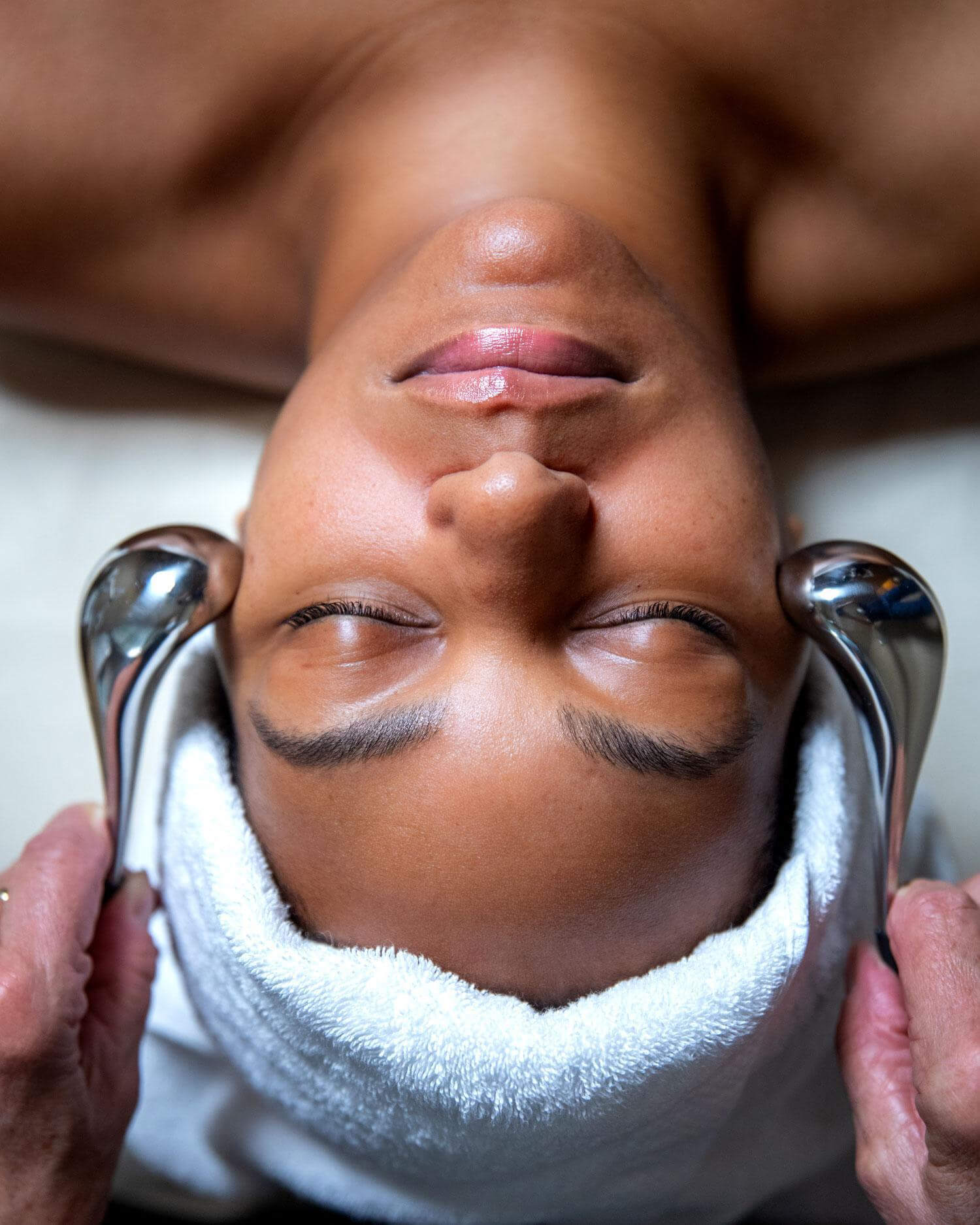 Woman enjoying a biologique recherche bespoke facial.