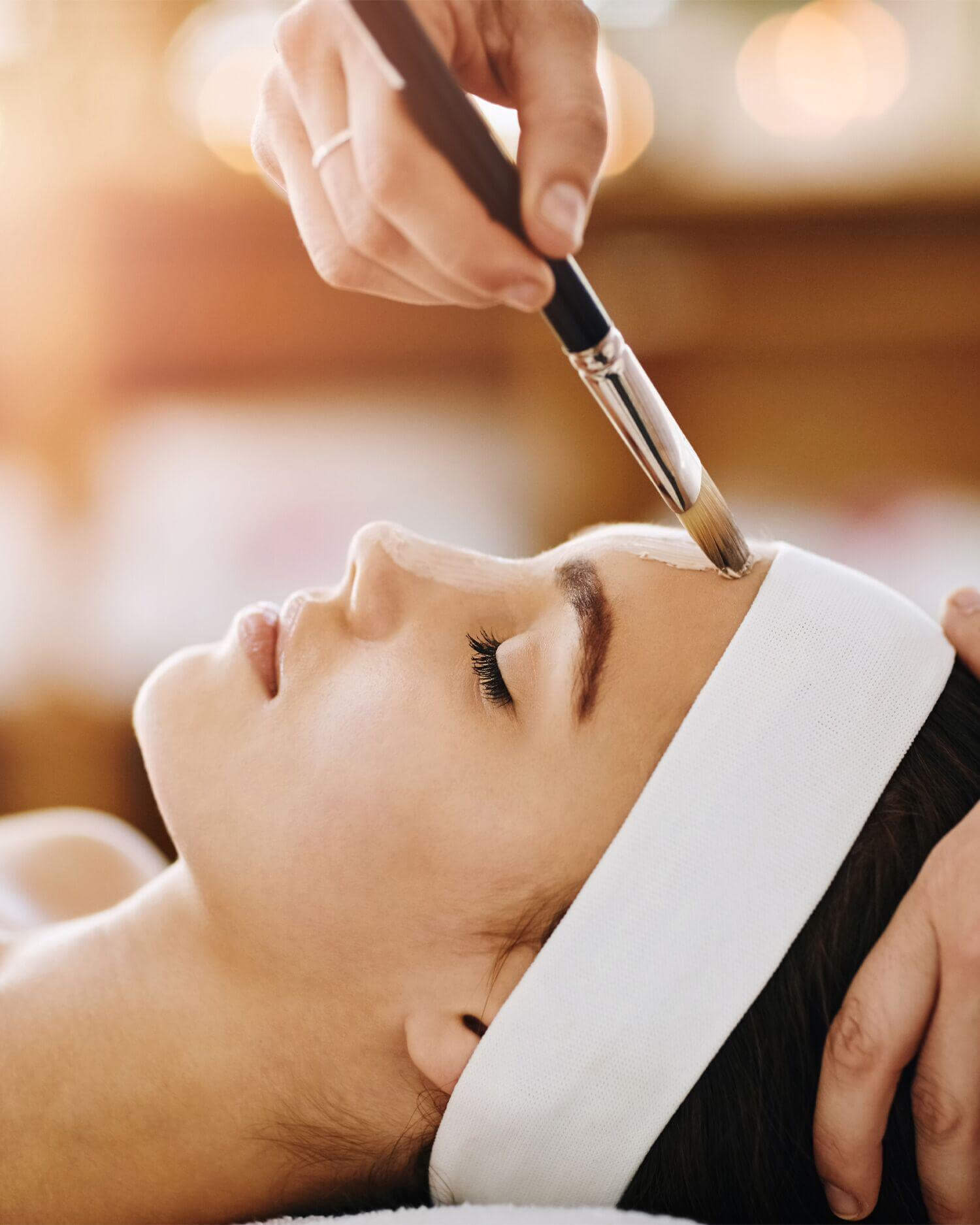 A woman getting a spa service