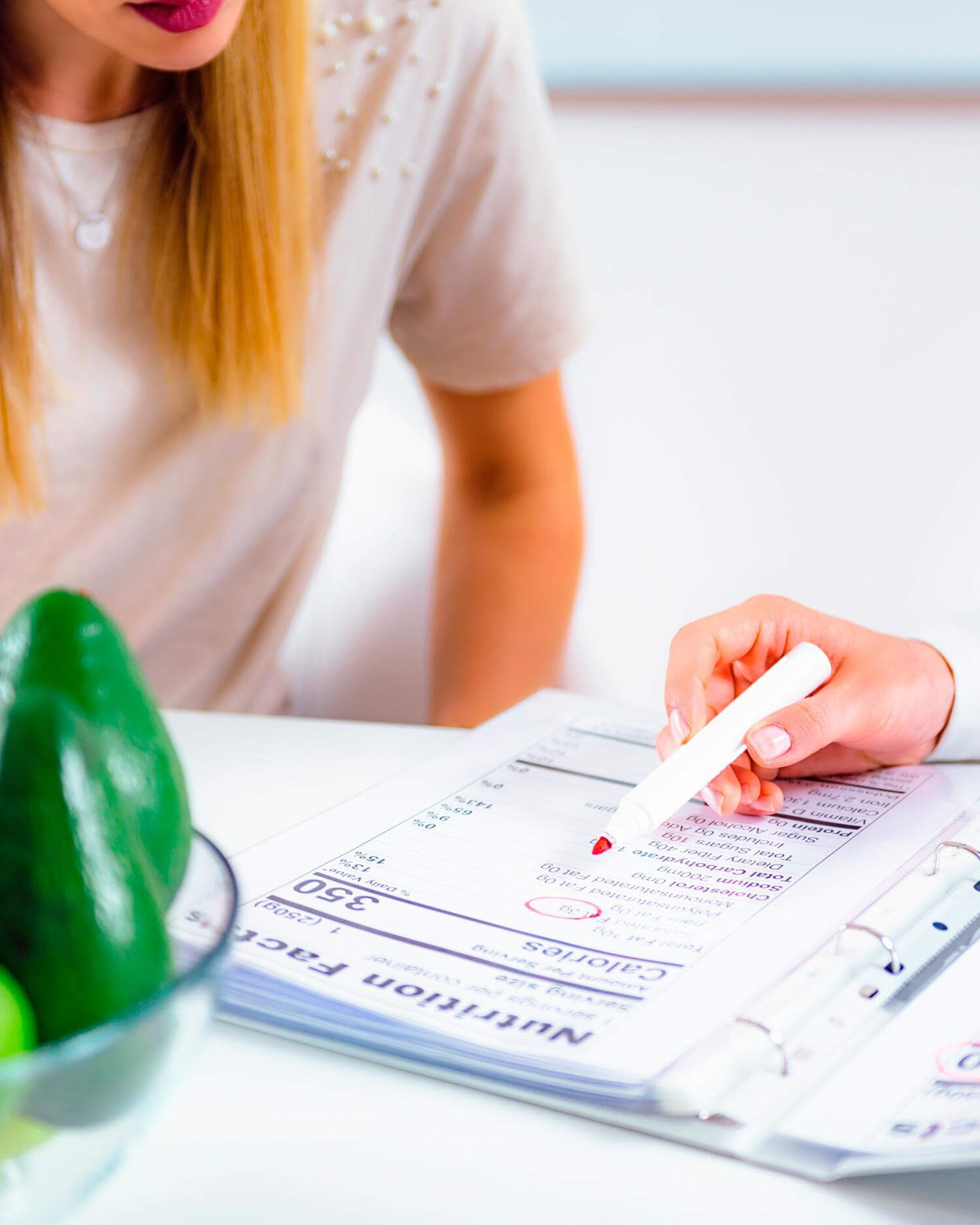 Woman receiving nutrition consult from expert