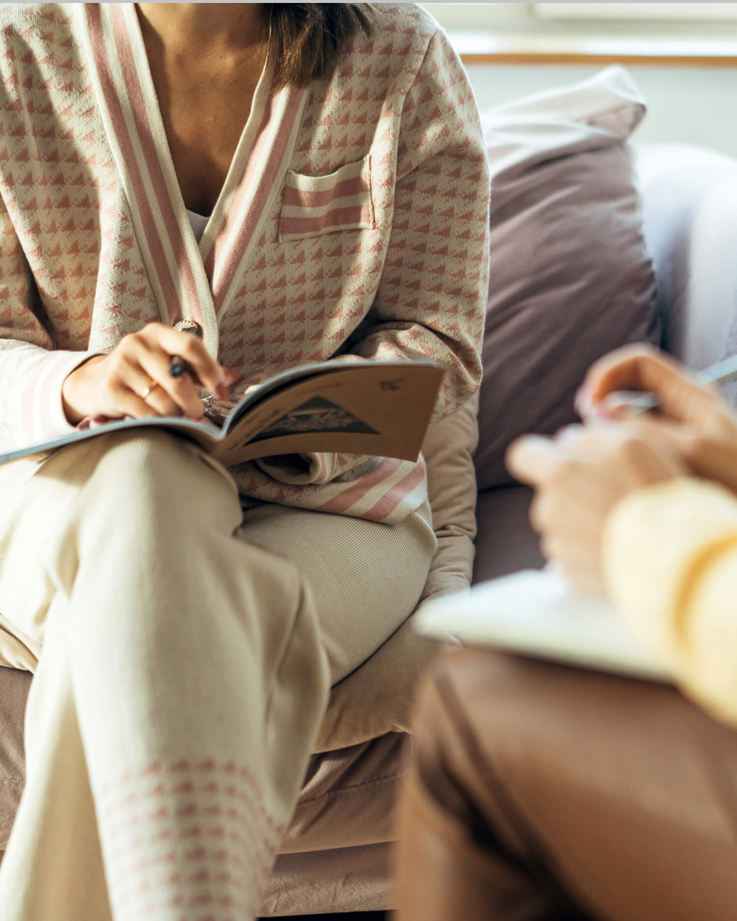 Woman receiving life mapping consultation.